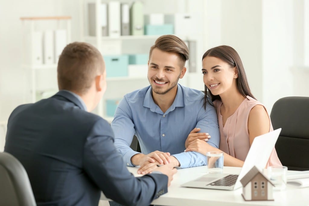 Couple at Table Talking About Home Loan